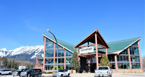 a large building with cars parked in front of it at Fernie Stanford Resort in Fernie