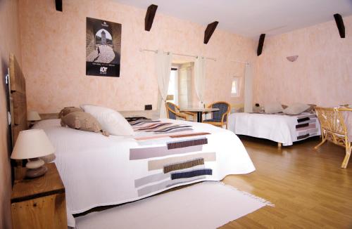 Katil atau katil-katil dalam bilik di Le domaine de l'Escadasse