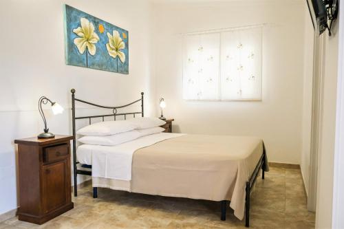 Säng eller sängar i ett rum på Terra D'Otranto