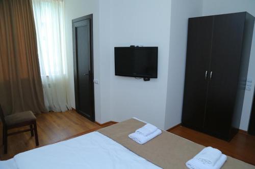 TV a/nebo společenská místnost v ubytování Merien Guesthouse 16