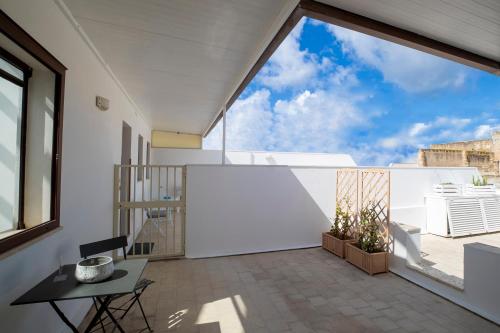 Un balcón o terraza de CasaTrapani