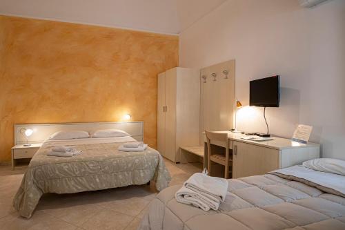 Cama o camas de una habitación en CasaTrapani