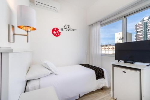 Postel nebo postele na pokoji v ubytování Hotel Romimar 3* Sup