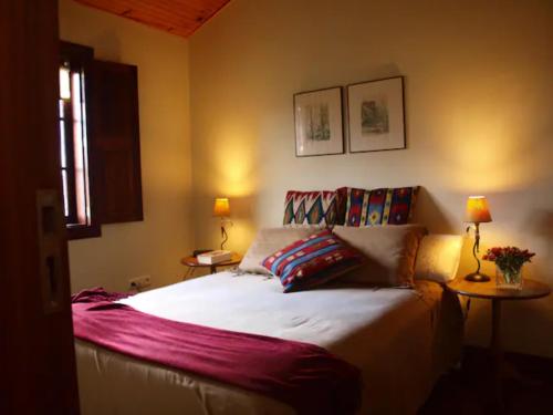 Postel nebo postele na pokoji v ubytování Casa de Ana