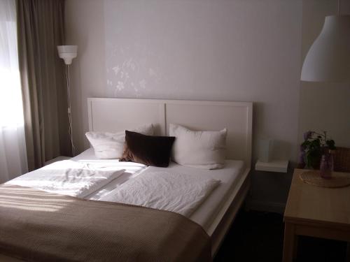 Een bed of bedden in een kamer bij Zur Weide
