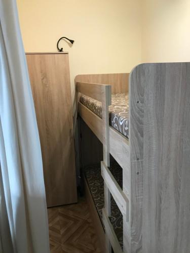 a couple of bunk beds in a room at Familienapartment am Strand in Primorsko in Primorsko