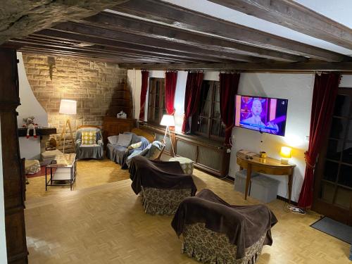 TV a/nebo společenská místnost v ubytování CHALET DE MANU
