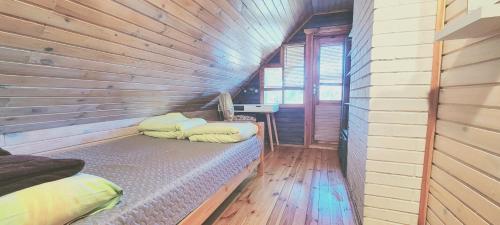 Кровать или кровати в номере Partsilombi Holiday Home