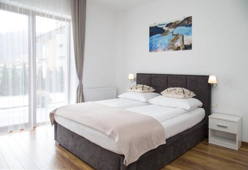 Willa Wójcik Apartamenty i Pokojeにあるベッド