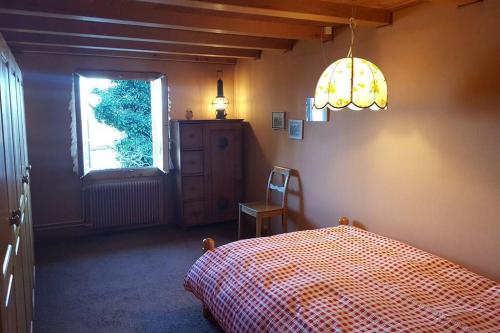 Postel nebo postele na pokoji v ubytování Bauernhaus mit Charme, Traumaussicht und Sauna