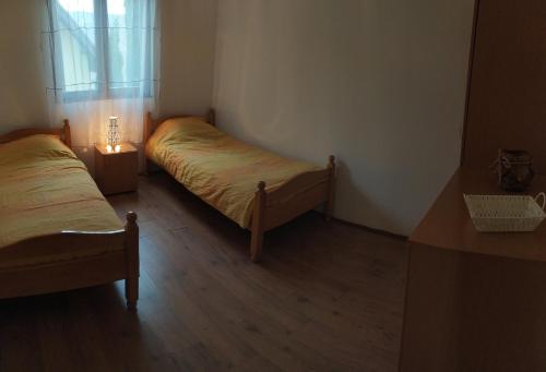 Ένα ή περισσότερα κρεβάτια σε δωμάτιο στο Vila Jezero