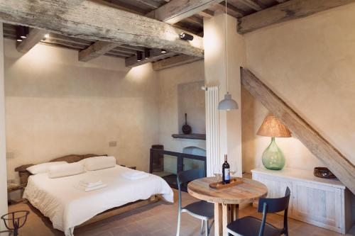 Säng eller sängar i ett rum på Piazza San Donato Casa Vacanze