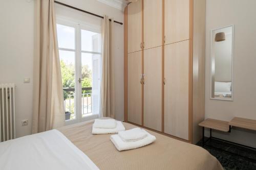 Ένα ή περισσότερα κρεβάτια σε δωμάτιο στο Navarino Apartment