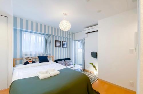 Кровать или кровати в номере japan house asakusa