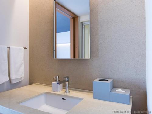 Salle de bains dans l'établissement HOTEL STRATA NAHA