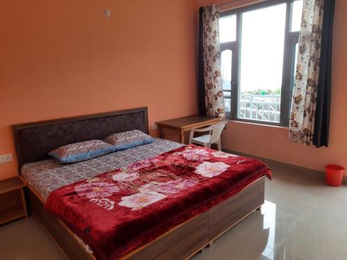 Katil atau katil-katil dalam bilik di BHAGSU HOME STAY