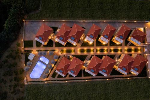 an overhead view of a group of houses at night at Costa D' Ifesto in Agios Ioannis Kaspaka
