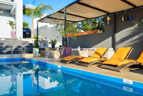 Бассейн в Adorno Luxury Villas или поблизости