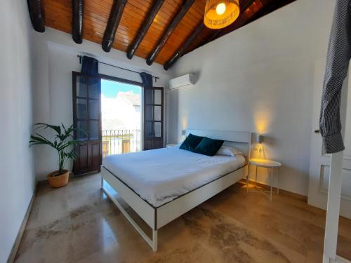 Ένα ή περισσότερα κρεβάτια σε δωμάτιο στο Apartamentos Avanel