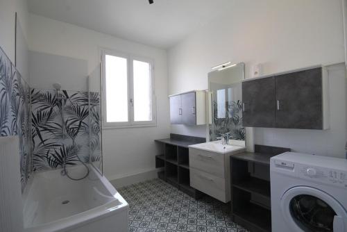 Ванна кімната в Appartements Le Cru Colbert