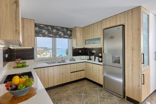 Η κουζίνα ή μικρή κουζίνα στο Breathtaking sea view flat in south Crete