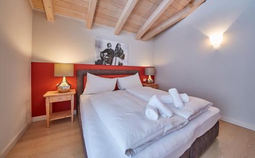 Posteľ alebo postele v izbe v ubytovaní Hüttl Relax Appartements