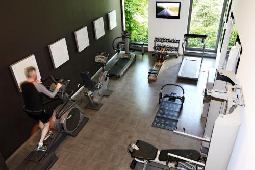 an overhead view of a man exercising in a gym at Studio K in Kortrijk