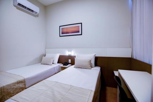 Katil atau katil-katil dalam bilik di Go Inn Betim - MG