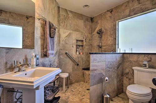 a bathroom with a sink and a toilet at Quiet Lakefront Retreat with Boat Ramp and 2 Docks in Hollywood Point