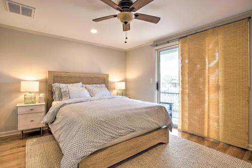a bedroom with a bed and a ceiling fan at Ocean Grove Home, Visit the Beachblock and Boardwalk in Ocean Grove