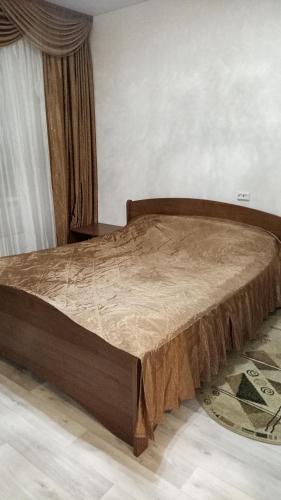 Cama ou camas em um quarto em Торпедо