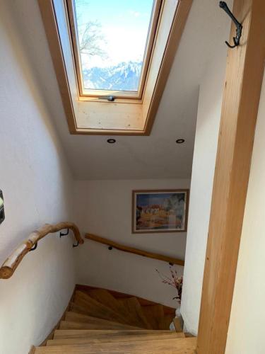 a skylight in the ceiling of a room with stairs at Ferienhaus Elisabeth in Füssen