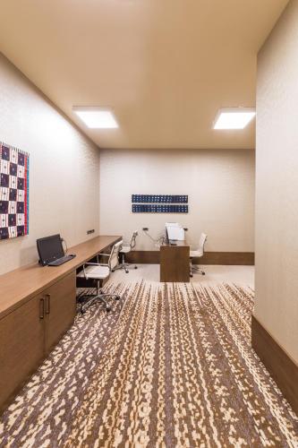 an office with desks and chairs in a room at Radisson Collection Hotel Bamako in Bamako