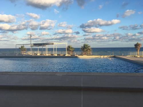 The swimming pool at or close to Apartament BAMBU N°2 przy plaży PIĘKNY WIDOK