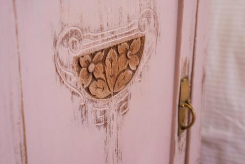 a door with a bunch of nuts in it at Fattoria Pian Di Rocca in Castiglione della Pescaia