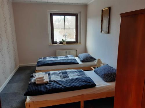 Postel nebo postele na pokoji v ubytování Moderne Ferienwohnung Zwickau