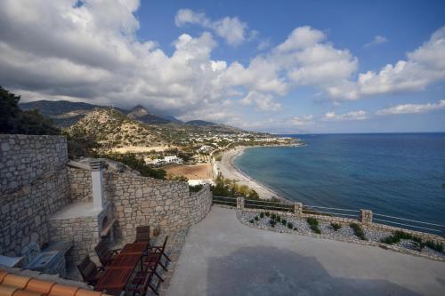 a view of a beach and the ocean at Villa Blue Dream in Koutsounari