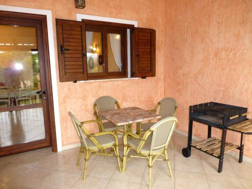 Fotografie z fotogalerie ubytování Villetta Luisella v destinaci Santa Margherita di Pula