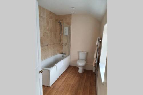 A seating area at Renovated cosy cottage within Cranborne Chase