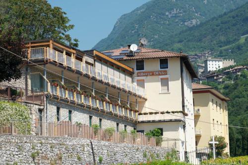 a building on the side of a mountain at Albergo Deva in Riva del Garda