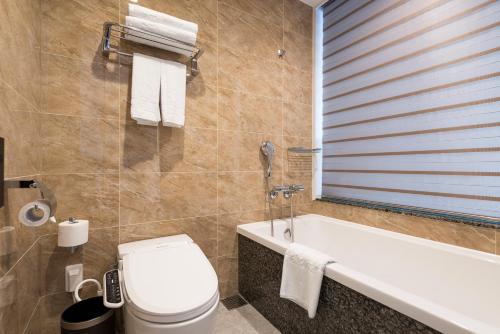 Ett badrum på Stanford Hotel&Resort Tongyeong