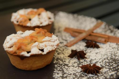 a couple of muffins sitting on top of a table at Radisson Blu Hotel Guwahati in Guwahati