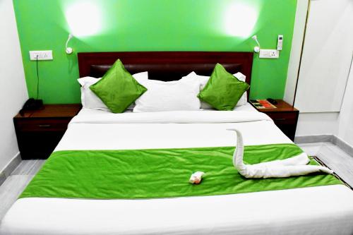 Postel nebo postele na pokoji v ubytování Hotel The Pride