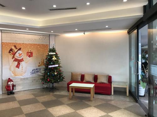 Posezení v ubytování Tai Shinu Hotel