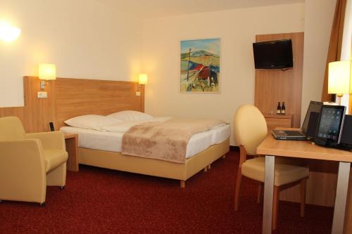 Μια τηλεόραση ή/και κέντρο ψυχαγωγίας στο Ringhotel Haus Oberwinter