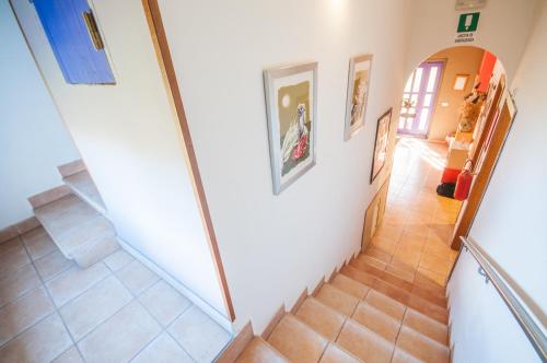 a staircase in a house with a hallway at Masseria Sant'Agapito in Lucera