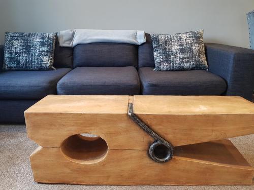 a living room with a couch and a wooden coffee table at Bowness On Windermere, Lovely Apartment for 4 With Parking in Bowness-on-Windermere