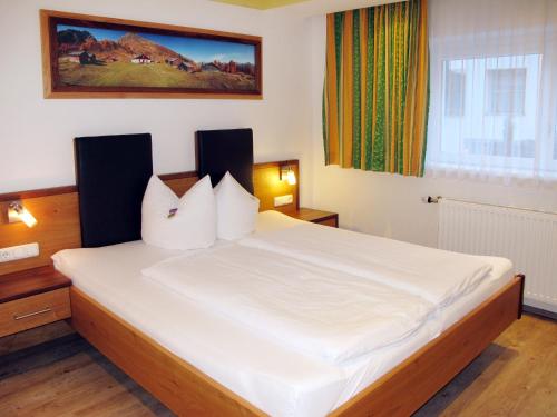 Posteľ alebo postele v izbe v ubytovaní Holiday Home Apart Garni Niederhof by Interhome
