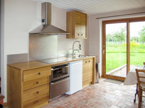 Η κουζίνα ή μικρή κουζίνα στο Holiday Home Le Verger by Interhome