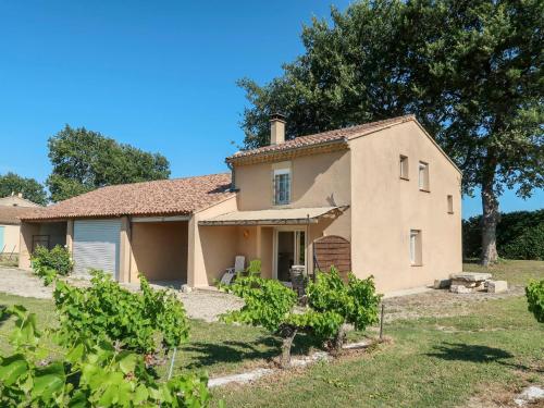 an old house with a garden in front of it at Holiday Home La Cardeline by Interhome in Grillon